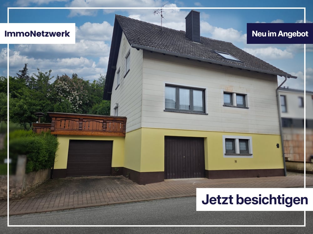 1?Familienhaus mit Ausbaupotenzial: Garten, Südterrasse, 2 Garagen & optionale 2. Wohneinheit