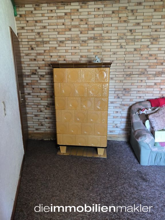Kachelofen im Zimmer EG