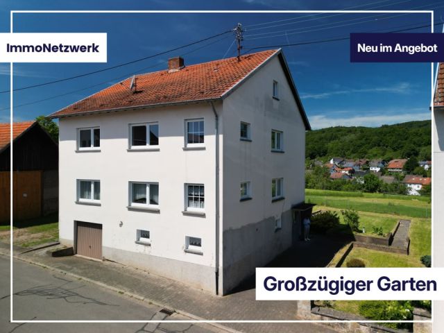 Gartenparadies mit Weitblick – großzügiges Zweifamilienhaus in Krottelbach
