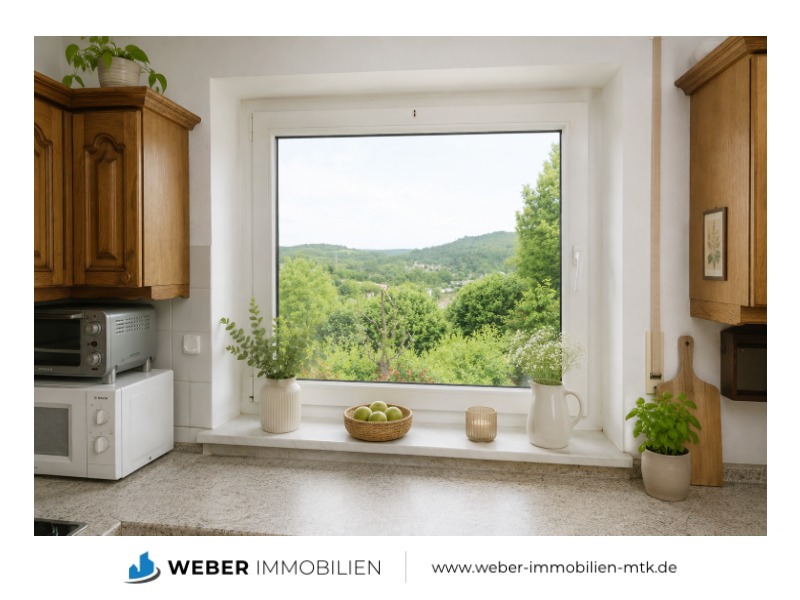 Zentral und doch im Grünen: Moderne Erdgeschosswohnung mit Sonnenbalkon