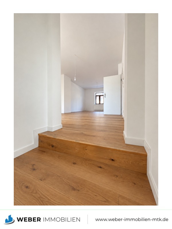 Modernes Wohnen im kernsanierten Altbau – mit Südbalkon, Terrasse und Garten