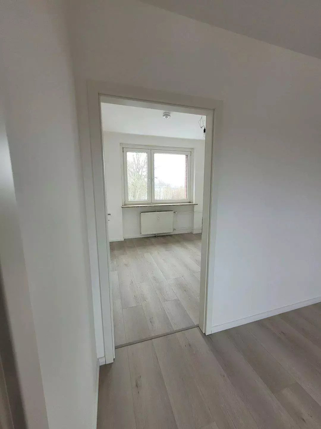 Blick vom Wohnzimmer 1 in Wohnzimmer 2