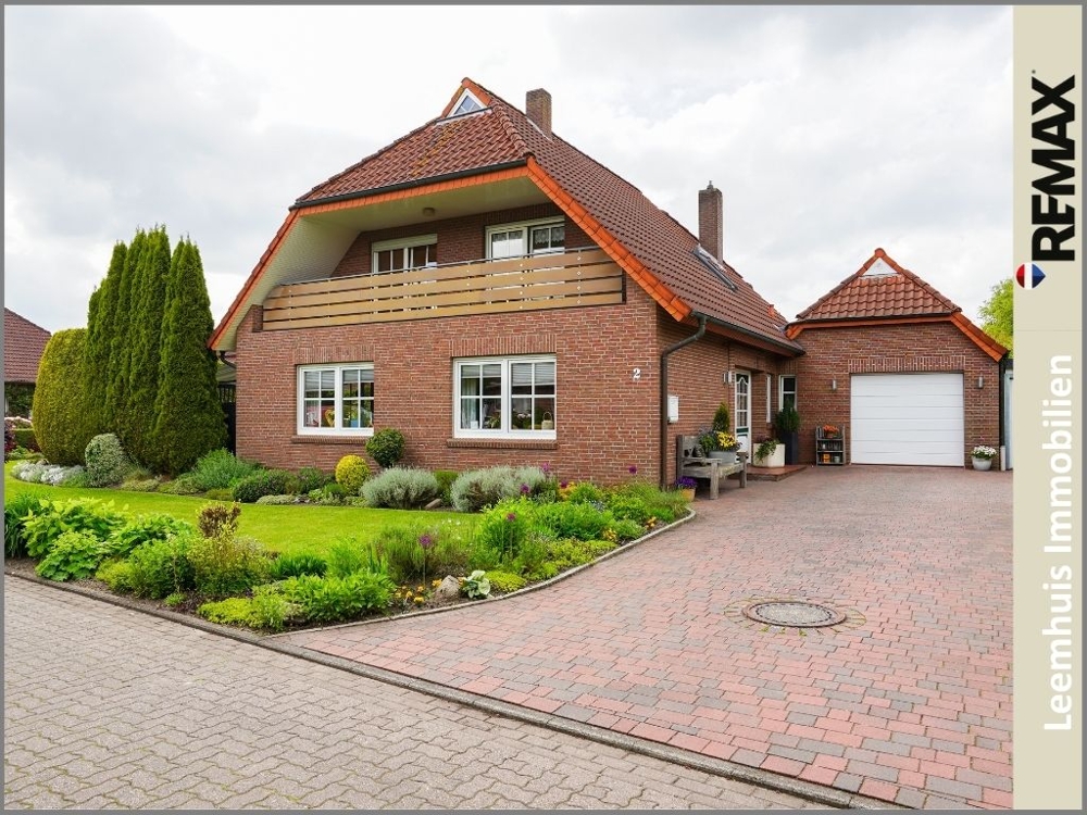 Gepflegtes Einfamilienhaus mit parkähnlichem Garten in bester Lage von Bunde!